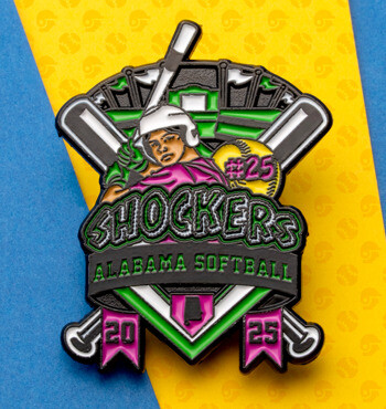 Enamel lapel pin for Shockers Alabama Softball featuring a player, crossed bats, and a stadium design on a blue and yellow background.
