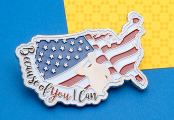 USA map shaped coin featuring the American flag, a saluting soldier silhouette, and the text Because of You I Can.