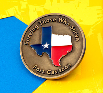 Antique bronze challenge coin featuring a Texas flag map silhouette and Fort Cavazos text.