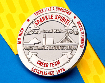 Police Athletic Activities League Sparkle Spirit cheer team challenge coin with silver finish and red text.