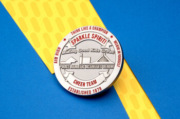 Police Athletic Activities League Sparkle Spirit cheer team challenge coin with silver finish and red text.